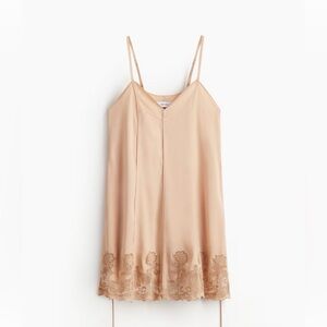 H&M Studio 2025
LACE-INSET SATIN DRESS